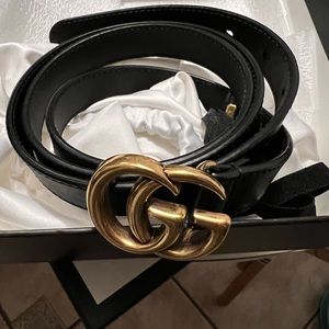 Thin woman’s Gucci belt